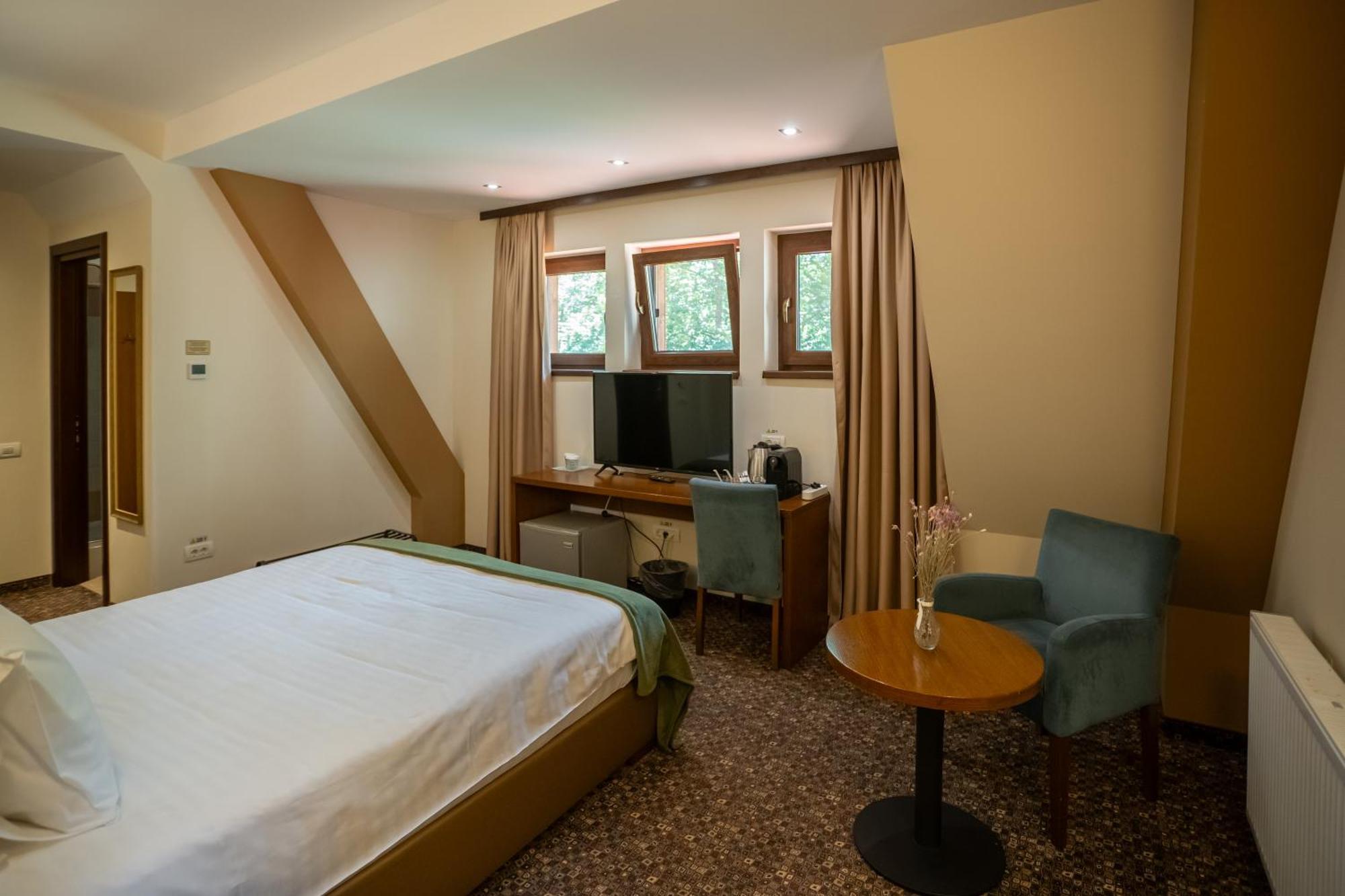 Opus Villa Sinaia Exterior foto A room at the hotel